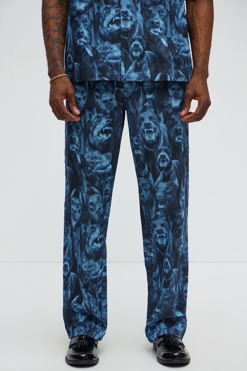 IMG_3735 NovaMEN Blue Graphic Face-Print Straight-Leg Trousers - Image 1